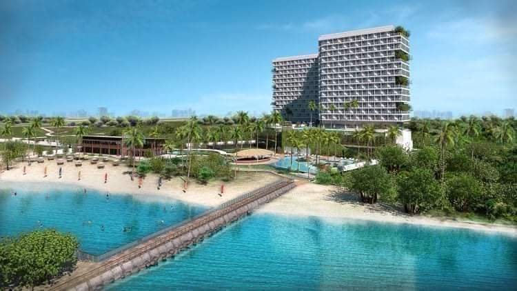 Costa Mira Beachtown Mactan beachfront project view showing the residential towers, landscaped resort grounds and shoreline